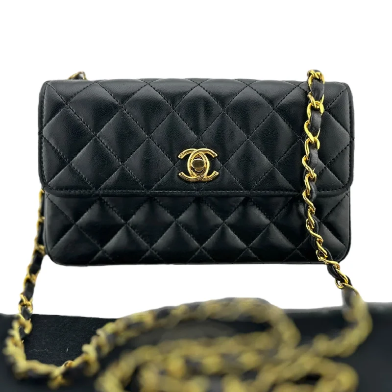 Chanel bags that pair perfectly with any outfitCHANEL Black Lambskin Turnlock Small Flap Chain Bag