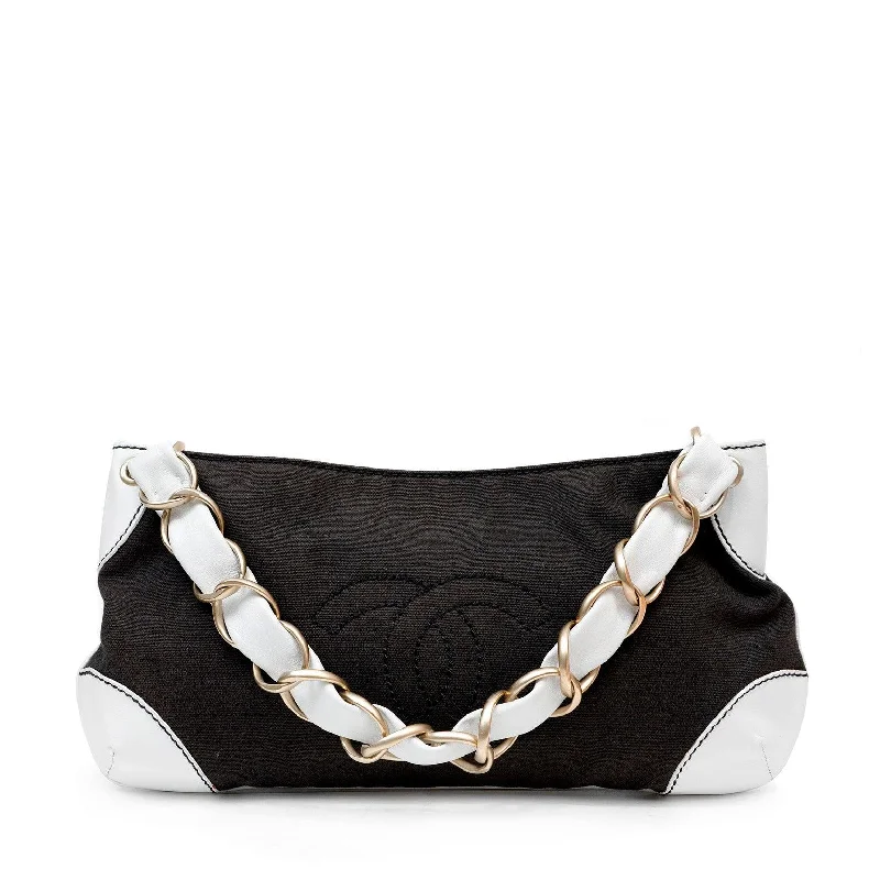 Chanel bags in luxury boutiques worldwideChanel Black & White Canvas Olsen Shoulder Bag w/ Gold Hardware