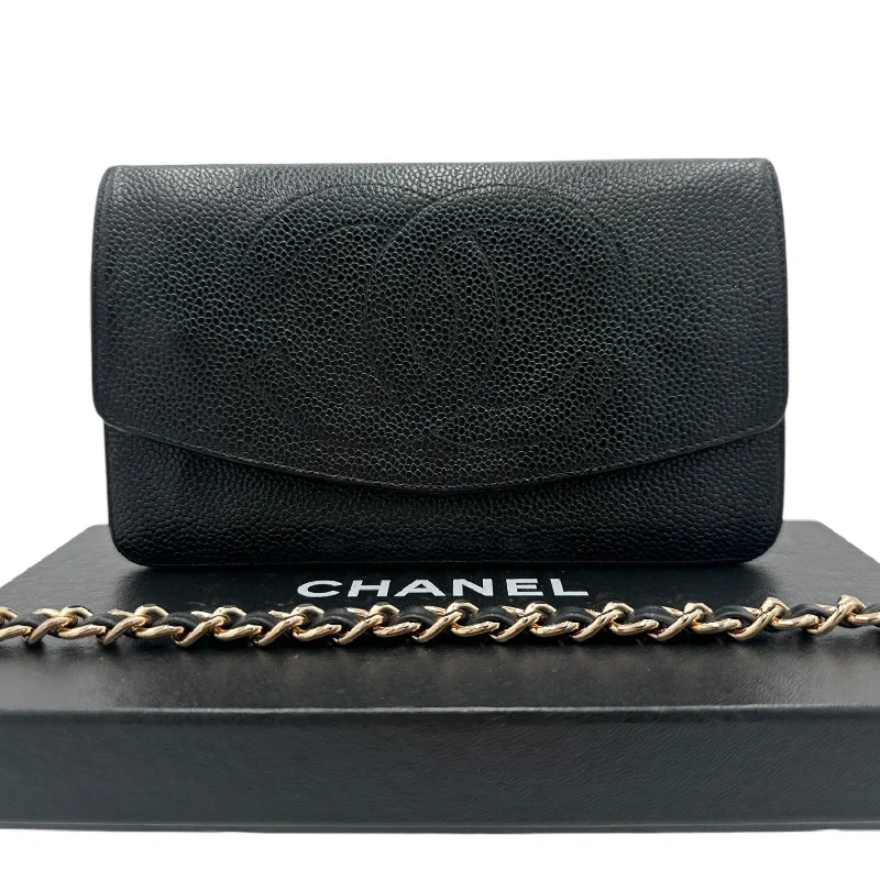 Chanel bags with gold, silver, and pearl accentsCHANEL Caviar Leather Timeless Clutch