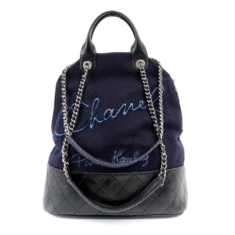 Chanel bags with iconic stitching detailsChanel Navy Blue Felt Bowler Bag w/ CC Embroidery