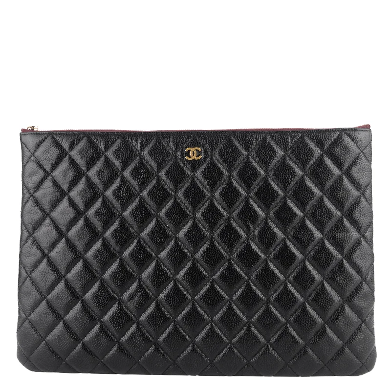 Chanel bags that pair perfectly with any outfitO Case Large Caviar Leather Clutch Bag