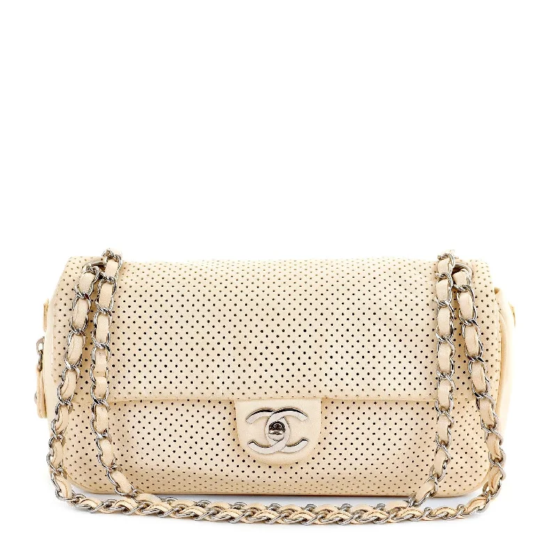 Chanel bags with the perfect balance of luxury and functionalityChanel Pale Yellow Perforated Leather Baseball Spirit Bag