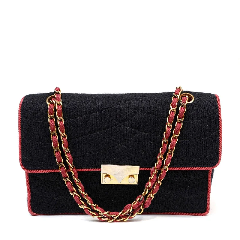 Chanel bags with iconic stitching detailsChanel Vintage COCO Chanel Navy/Pink Cloth w/ Gold Hardware