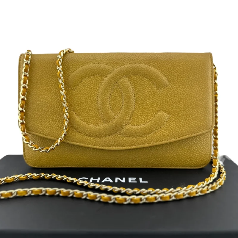 Chanel bags with iconic gold chainsCHANEL Caviar Timeless Clutch