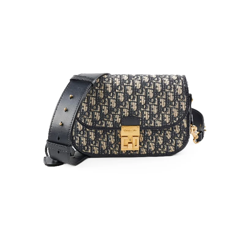 Contemporary Christian Dior handbags with a unique shapeChristian Dior Totter Flap Navy Oblique Crossbody