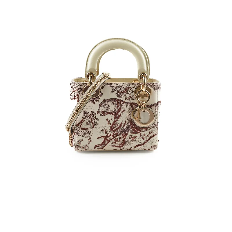 Christian Dior handbags with a detachable mirror for on - the - go touch - upsChristian Dior Mini Lady Dior Calfskin Limited Edition Embroidered Bag Ivory/Burgundy