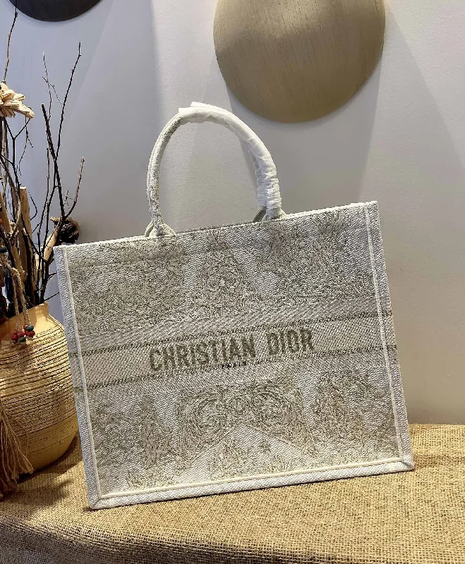 Christian Dior Saddle bags with a distressed leather finishChristian Dior Book Tote Bag