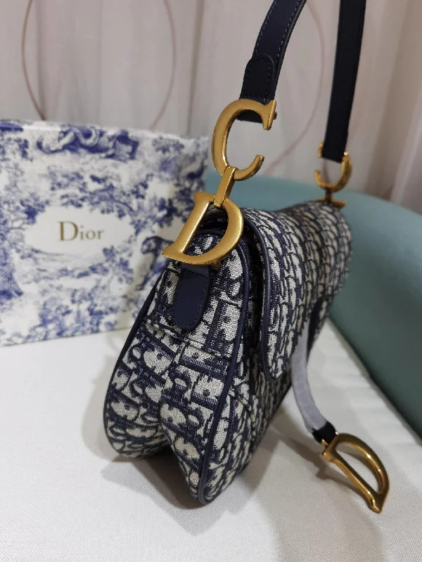 Christian Dior Saddle bags with a distressed leather finishChristian Dior Saddle Bag