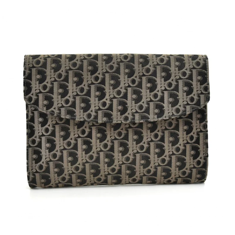 Christian Dior tote bags with a printed Dior logo on the frontWeaved Monogram Jacquard Fabric Clutch Bag