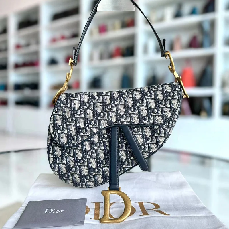 Christian Dior Saddle bags with a studded trim for a bold lookSaddle Medium Embroidery Canvas Monogram Dark Blue Golden Hardware