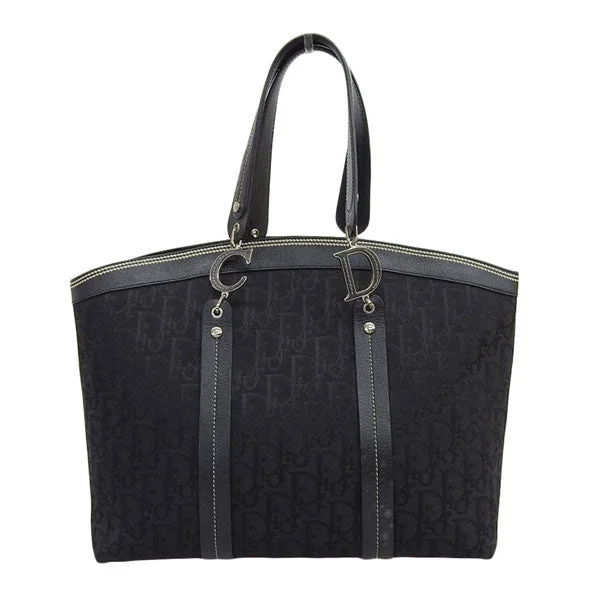 Christian Dior tote bags with a printed Dior logo on the frontDIOR Trotter Pattern Flower Line Tote Bag Black