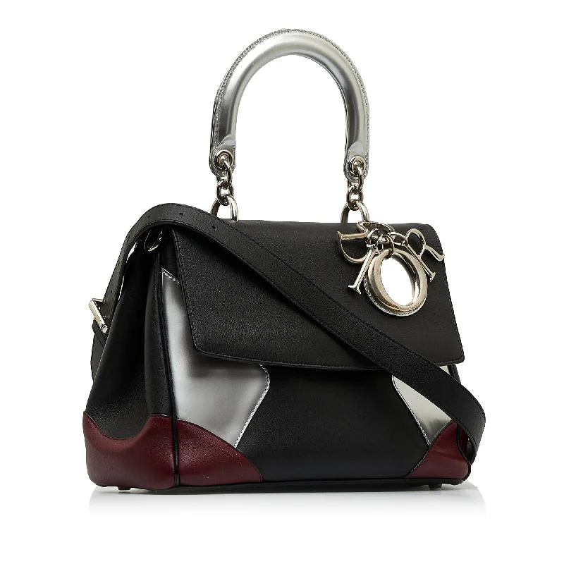 Christian Dior handbags with a snap - button closure and a decorative buckleDIORBe  Satchel